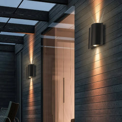 Applique da esterno up down moderno LED in metallo nero con profilo ondulato