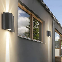 Applique da esterno up down moderno LED in metallo nero con profilo ondulato