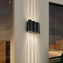 Applique da esterno up down moderno LED in metallo nero con profilo ondulato