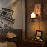 Applique in legno rustico a forma di candela per camera