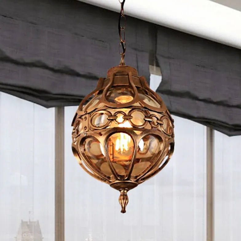 Spherical Carved Antique Copper Tone Pendant Light