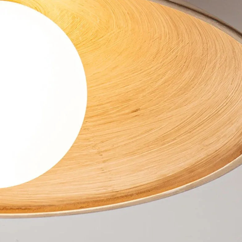 Spherical Warm-Toned Ceiling Light for Corridor