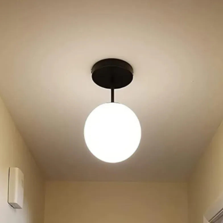 Lampadario a sospensione sfere vetro bianco minimalista